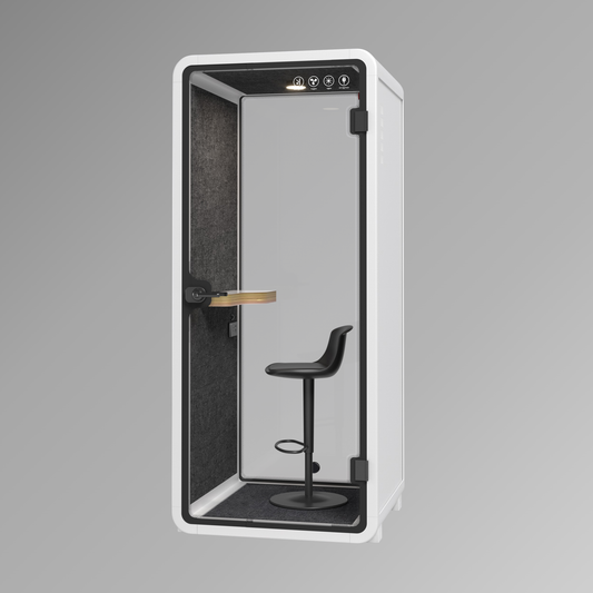 Modern office pod with glass door and black stool on a gray background