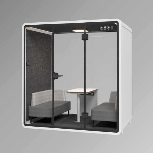 Modern office pod with glass walls, seating, and a small table on a gray background