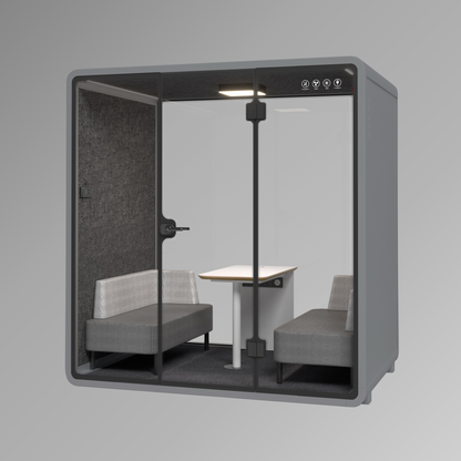 Office pod with seating and a table on a gray background